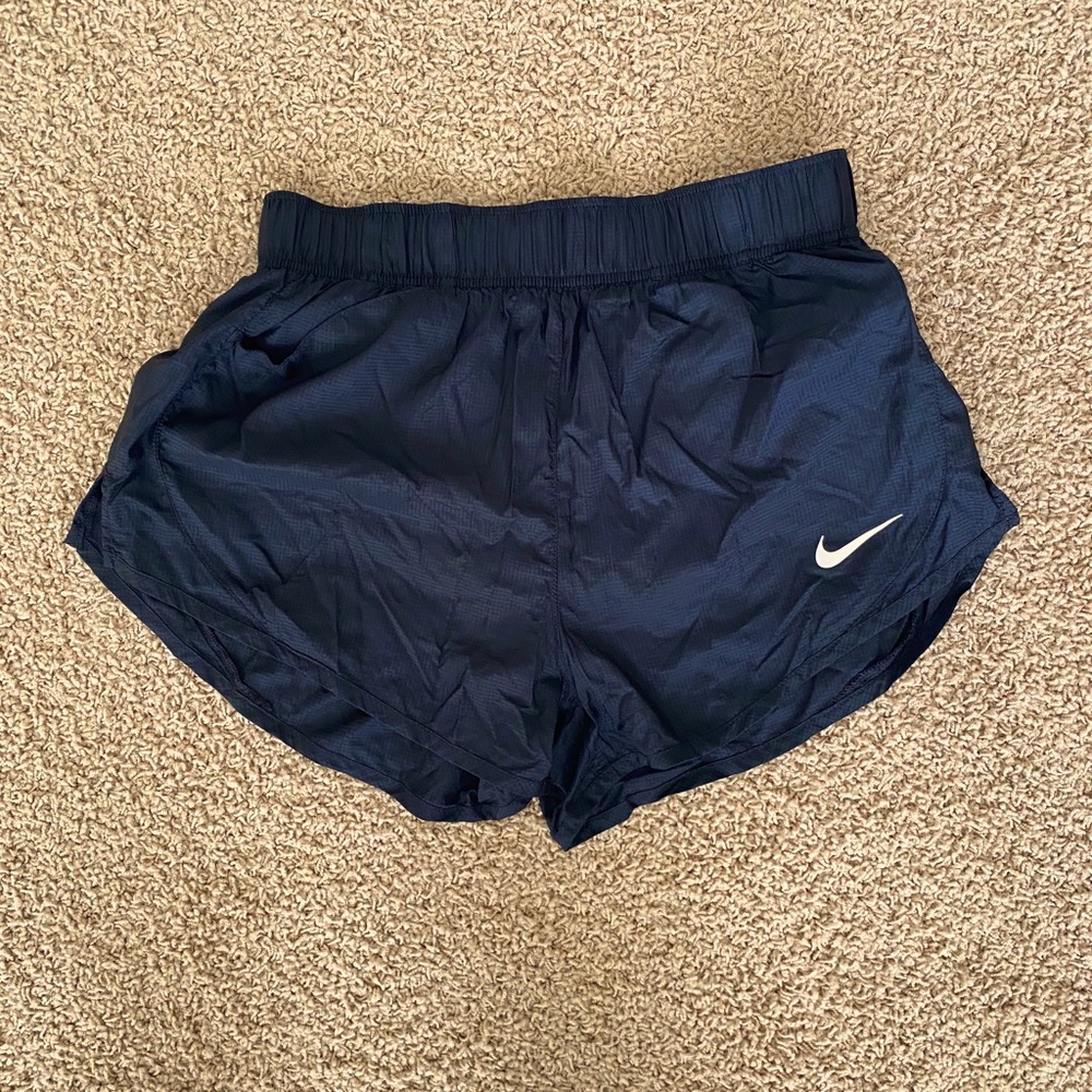 Black Nike running shorts
